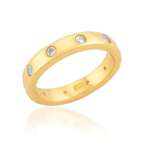 Side view of solid plated gold ring with quartz crystal running through the band.