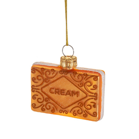 A glass bauble shaped like a custard cream biscuit