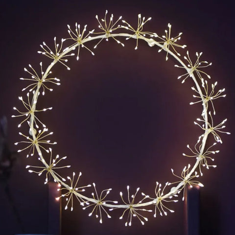 An image of the starburst wreath on dark