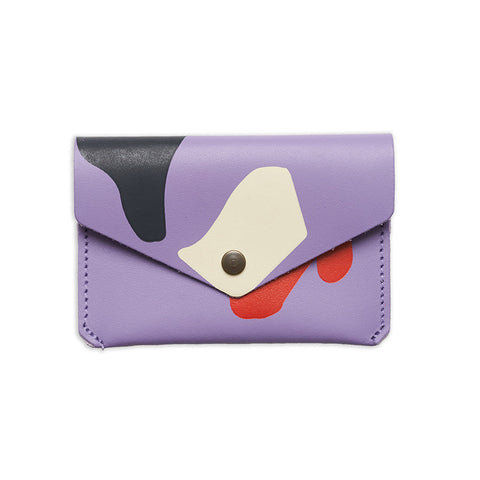 Rectangular leather purse with a folded close and popper in lilac with colourful abstract designs. 