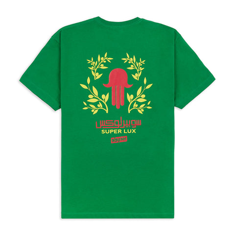 Reverse of green tshirt featuring a graphic print of Fatima's hand in red and yellow.