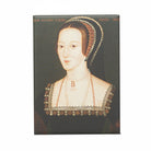 Magnet of Anne Boleyn in a black dress and a black headdress with pearls and her 'B' pearl necklace.