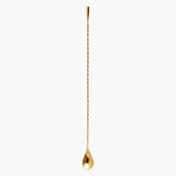 A golden teardrop barspoon.