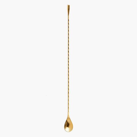 A golden teardrop barspoon.