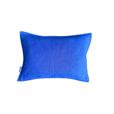 Reverse of rectangular cushion with a block colour blue linen back.