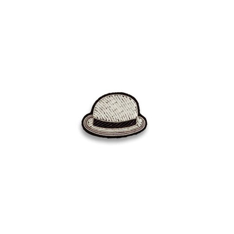 Bowler hat shaped embroidered brooch in white with centre black band.