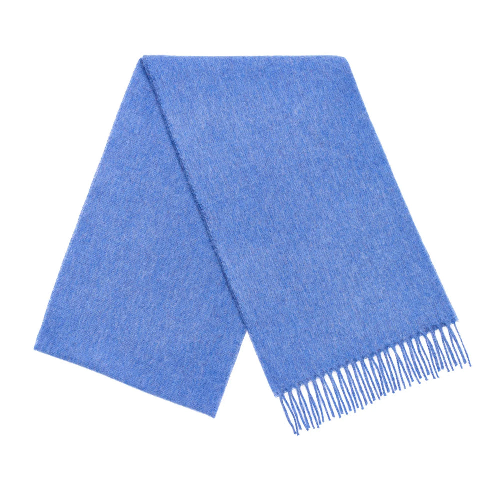 A folded blue woven scarf with fringed ends, displayed on a clean white background.