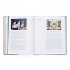 Open book with images and text on a white background