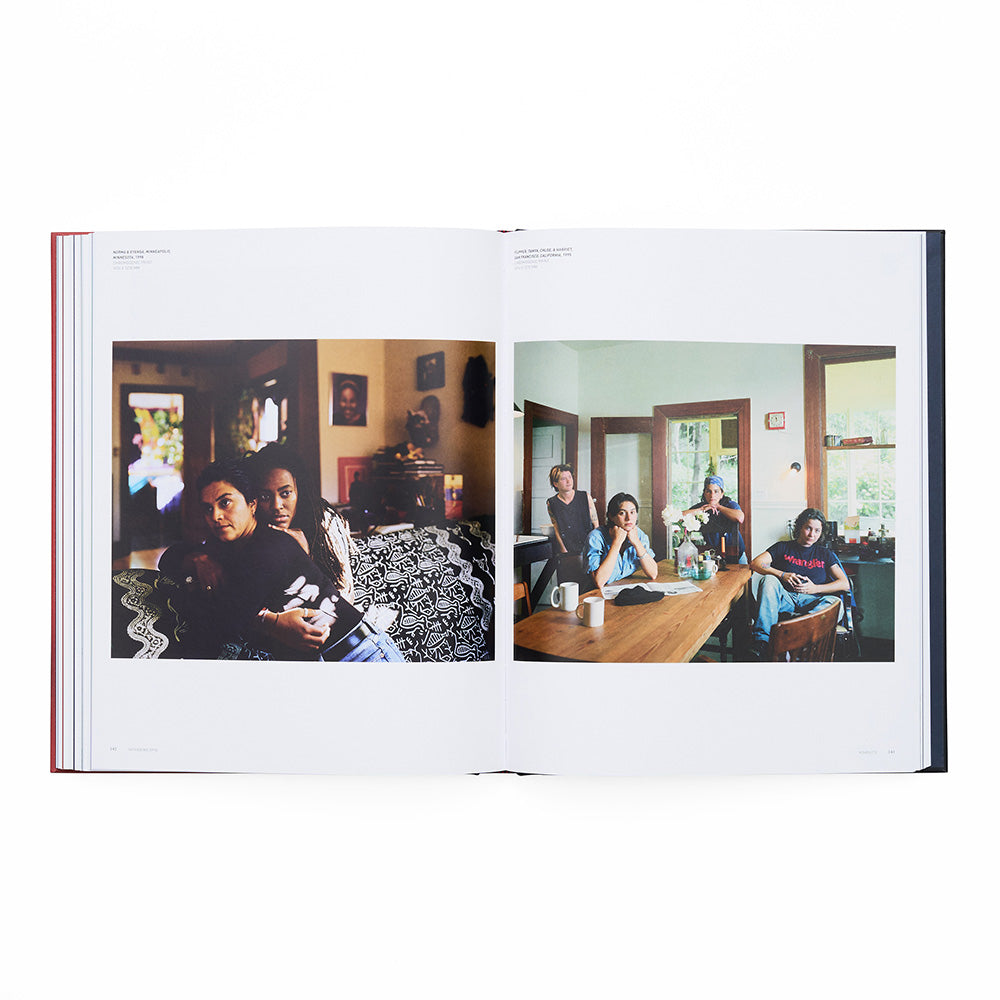 Open book showing two interior scenes with people in a living room and dining area.