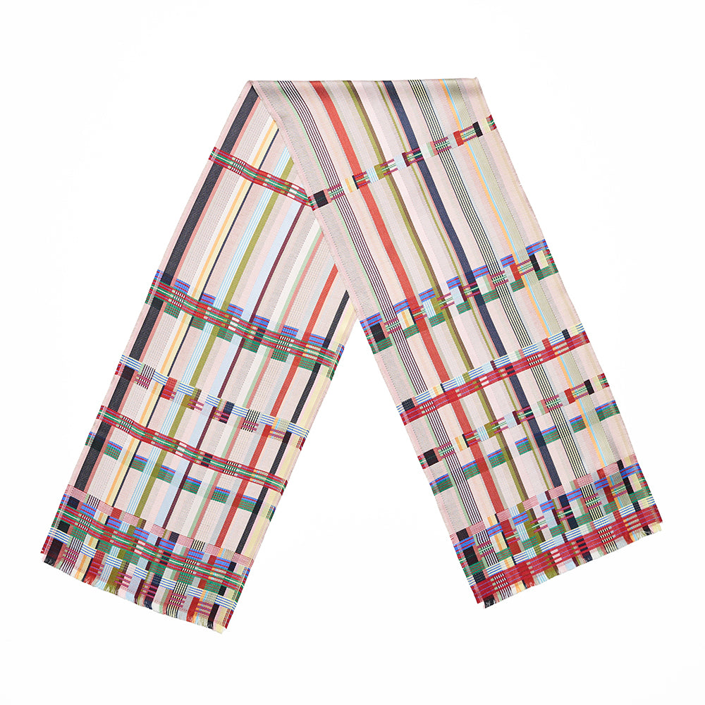 A multicoloured scarf with a geometric pattern of stripes and squares folded in a v shape.