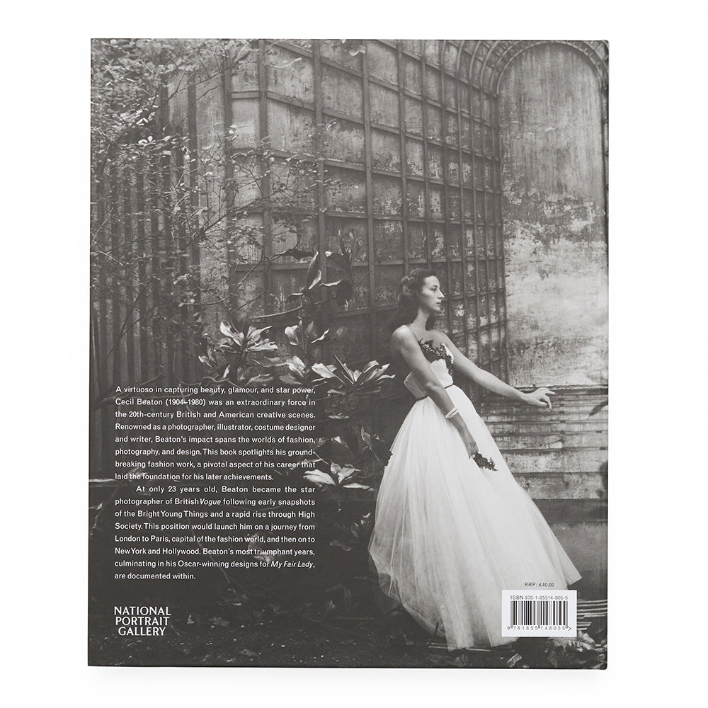 Back book cover featuring a black and white photograph of a woman in a white dress standing against a garden backdrop.