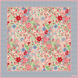 Full print Celia Birtwell scarf with a blue and red floral pattern.