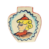 Hand-painted vase with a head in profile with blonde hair and a red hat,  back view.