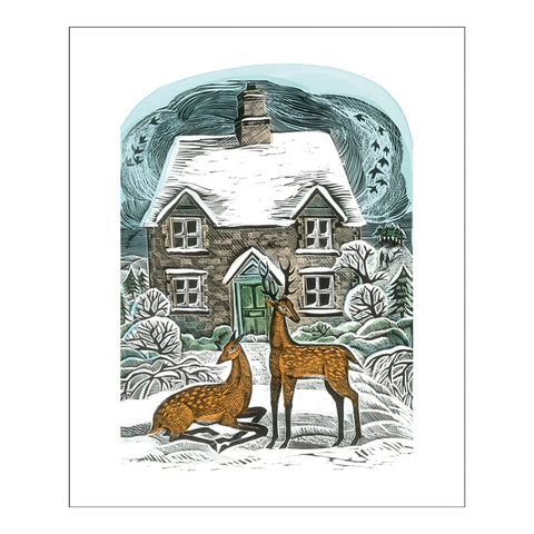 Christmas card featuring an illustrated festive scene with a snow covered cottage and deer outside.  