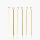 6 gold cocktail sticks for olives, oranges, etc. 