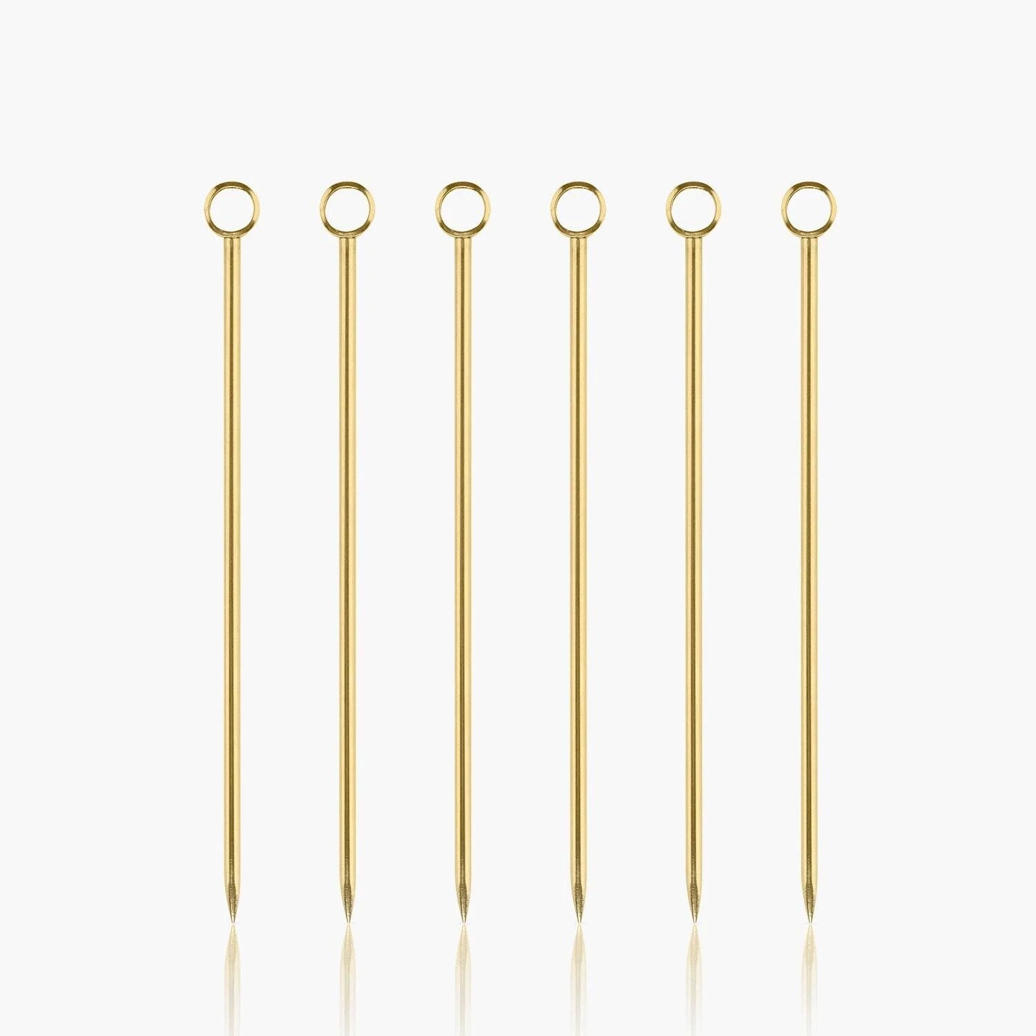 6 gold cocktail sticks for olives, oranges, etc. 