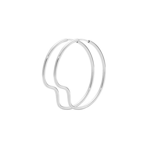 Large silver hoop earrings with a s-like bend in them.