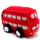 Crocheted red double-decker bus rattle toy on a white background