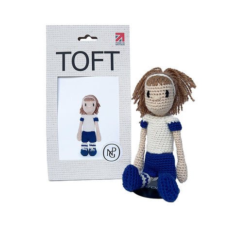Women's footballer crochet doll in full kit.