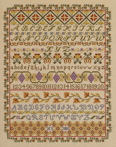 Multicoloured cross-stitch kit with the alphabet and numbers surrounded by a pattern of leaves and floral design.