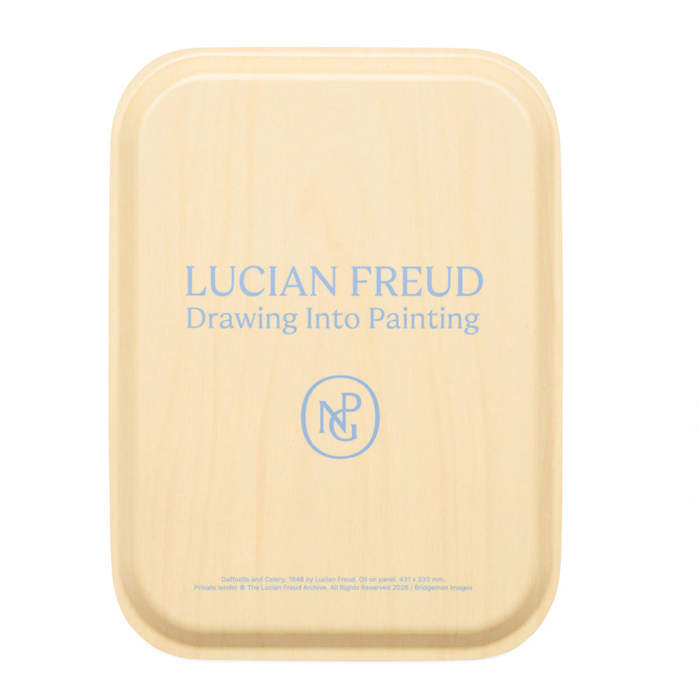 Reverse of tray with the text 'lucian freud drawing into painting' in blue against wood.