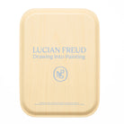 Reverse of tray with the text 'Lucian Freud Drawing into Painting' in blue against wood.