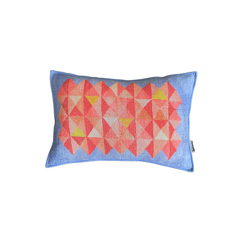 Front of linen cushion with a red and yellow geometric pattern in the centre and blue outer border. 