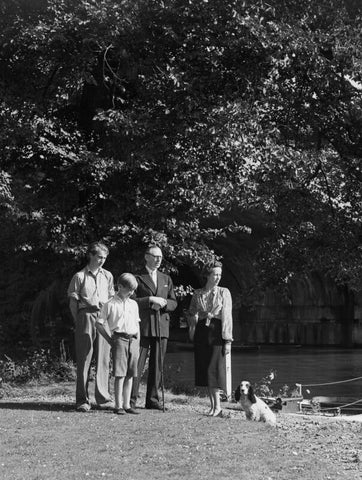 Group photo of John Patrick Graham-Toler with his parents, Ronald, 5th Earl of Norbuy and Margaret, Countess of Norbury. Also present is his brother, John. NPG x78445