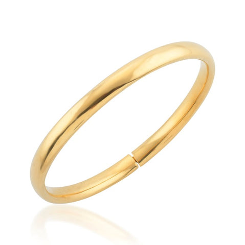 A smooth gold bangle in a minimal design with a click fastening.