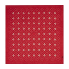 Red square bandana with geometric pattern on a white background