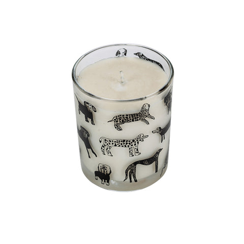 Glass candle with black line drawings of dogs on the outside.