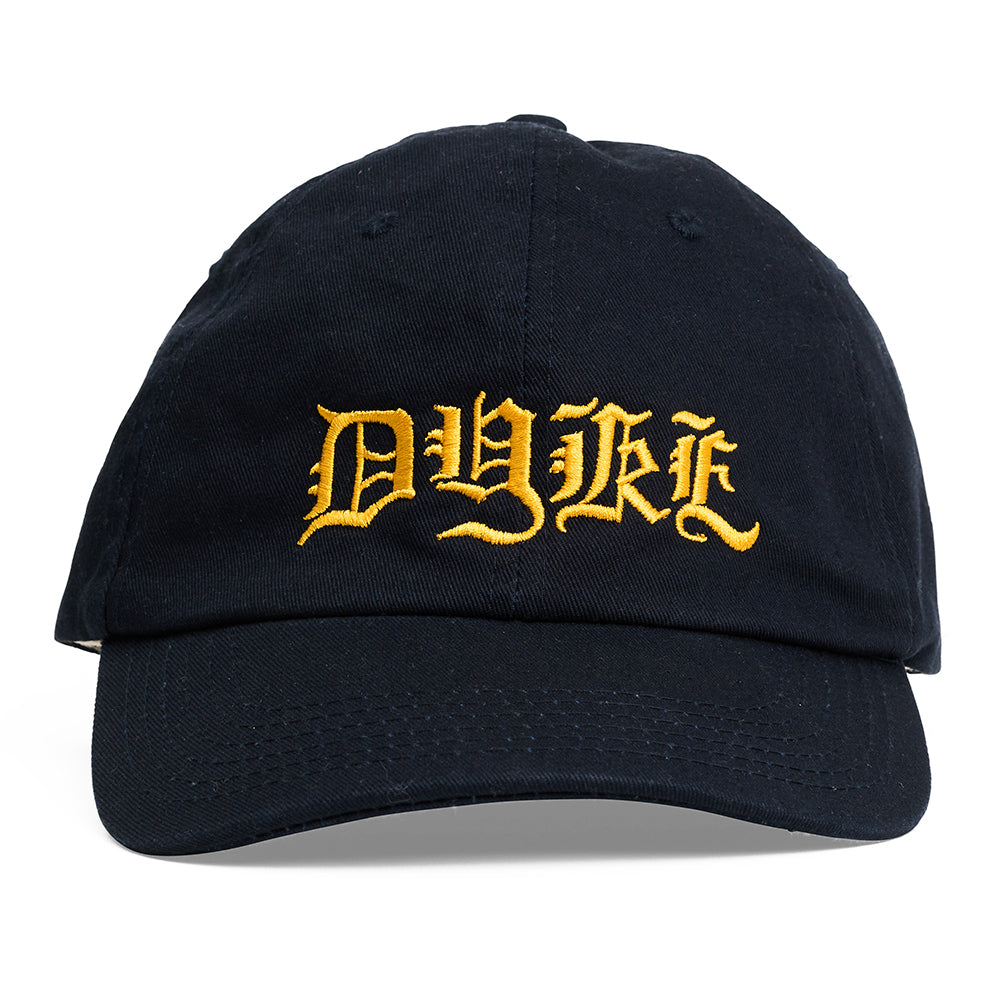 Black cap with yellow 'dyke' word embroidery on a white background