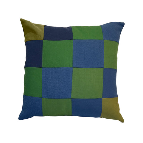 Chequered pillow cushion in multicoloured blues and greens.