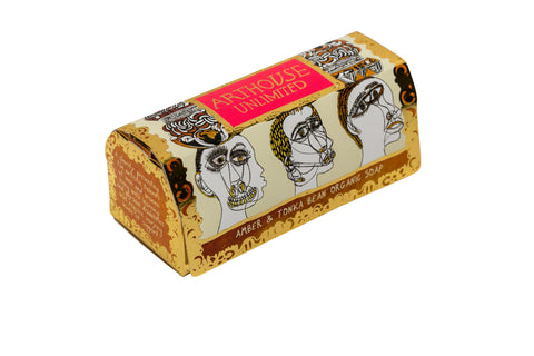 Tubular shaped soap in gold packaging with illustrated figureheads design.