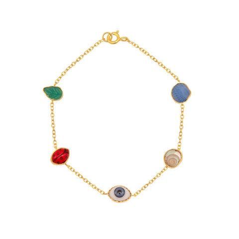 Five multicolour charms of a leaf, ladybird, eye and two shells on a gold chain bracelet. 