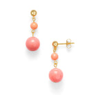 A pair of pink beaded earrings with a gold clasp against a white background