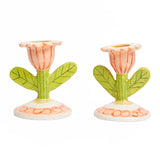 A pair of 3D tulip shaped ceramic candlestick holders with stem centre.