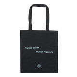 Black tote bag with Francis Bacon Human Presence with a small NPG logo at the bottom, all in bright blue print. 