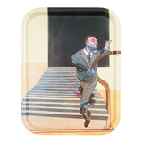 A tray with the image of an abstract man walking down some steps.