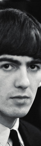 Long rectangular bookmark featuring a close-up black and white photograph of George Harrison.