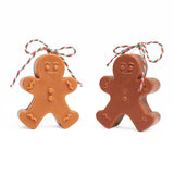 Dark brown and light brown gingerbread men side by side. 