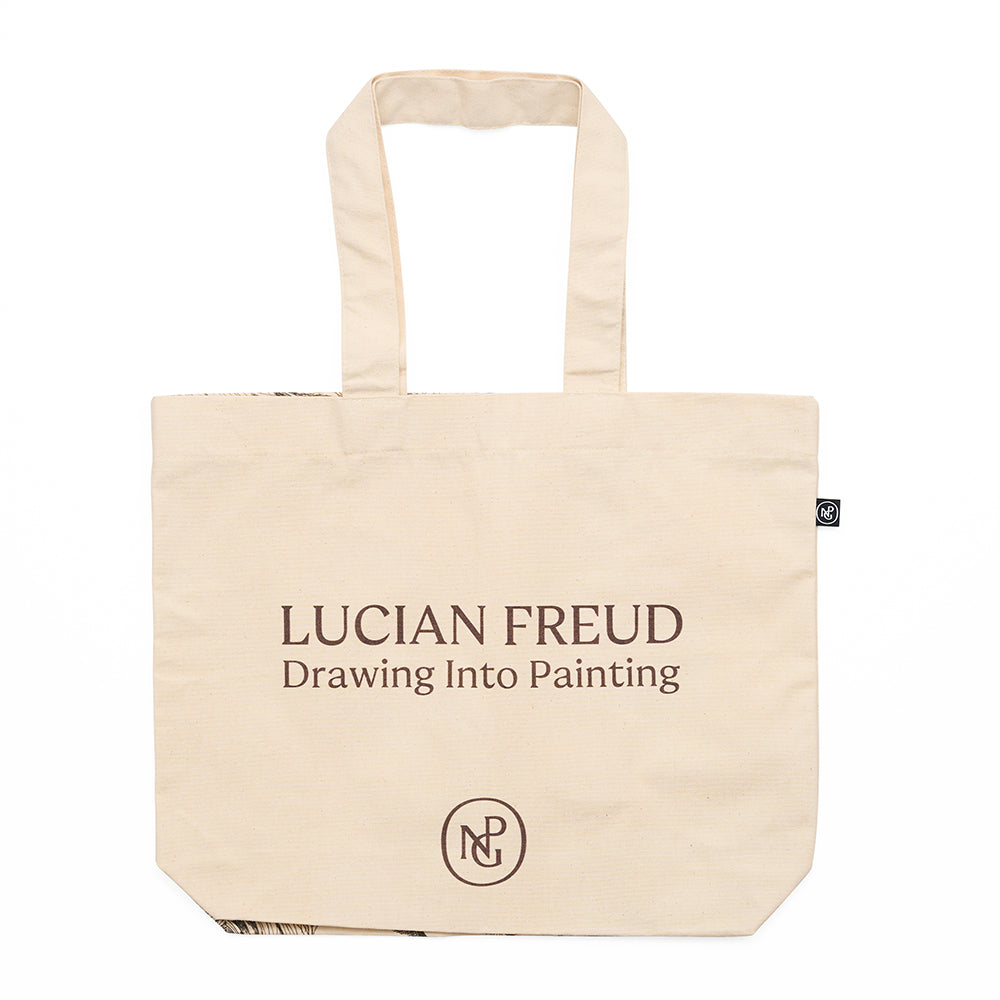Beige tote bag with 'lucian freud drawing into painting' text on a white background