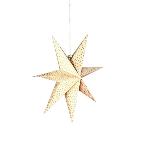 A 3D star shaped paper decoration in cream with gold dots hanging from a cream thread.