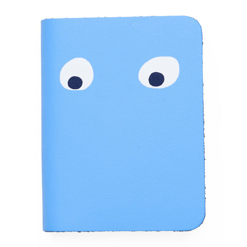 Blue mini notebook featuring printed googly eye design . 