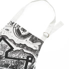 Close up of black and white apron with illustrated map design on a white background