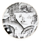 Ceramic plate with black and white illustrations and text with an outer gold rim. 