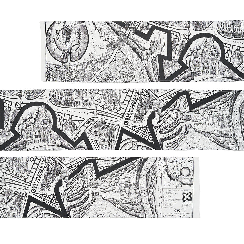 Black and white illustrated map design on a table runner against a white background.