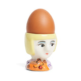 Grayson Perry ceramic egg cup with a boiled egg in it. 