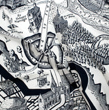 A close up of the scarf showing a black and white map of a city and forest. 