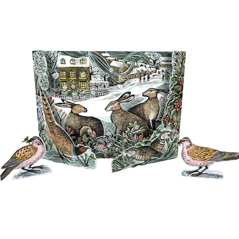 A paper advent calendar that folds out with some hares and a winter landscape. 